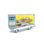 A Corgi Toys 235 Oldsmobile Super 88, metallic steel blue body, red interior, spun hubs, in original