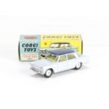 A Corgi Toys 217 Fiat 1800 Saloon, pale blue body, dark blue roof, lemon interior, smooth hubs, in