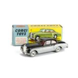 A Corgi Toys 224 Bentley Continental Sports Saloon, black over silver body, red interior, spun hubs,