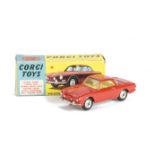 A Corgi Toys 239 Volkswagen 1500 Karmann Ghia, red body, yellow interior, spun hubs, in original