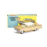 A Corgi Toys 248 Chevrolet Impala, light brown body, white roof, cream interior, spun hubs, in