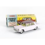 A Corgi Toys 232 Fiat 2100, pale pink body, mauve roof, lemon interior, spun hubs, in original