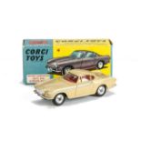 A Corgi Toys 228 Volvo P.1800, beige body, red interior, spun hubs, in original box with club