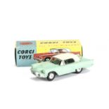 A Corgi Toys 214 Ford Thunderbird, pale green body, cream hardtop, no interior, smooth hubs, in