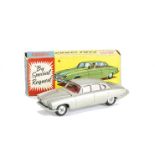 A Corgi Toys 238 Jaguar Mark X, silver body, red interior, spun hubs, two pieces of luggage, in