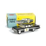 A Corgi Toys 223 Chevrolet Impala State Patrol, black body, silver stripe, lemon interior, smooth