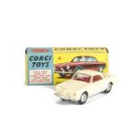 A Corgi Toys 239 Volkswagen 1500 Karmann Ghia, cream body, red interior, spun hubs, in original box,