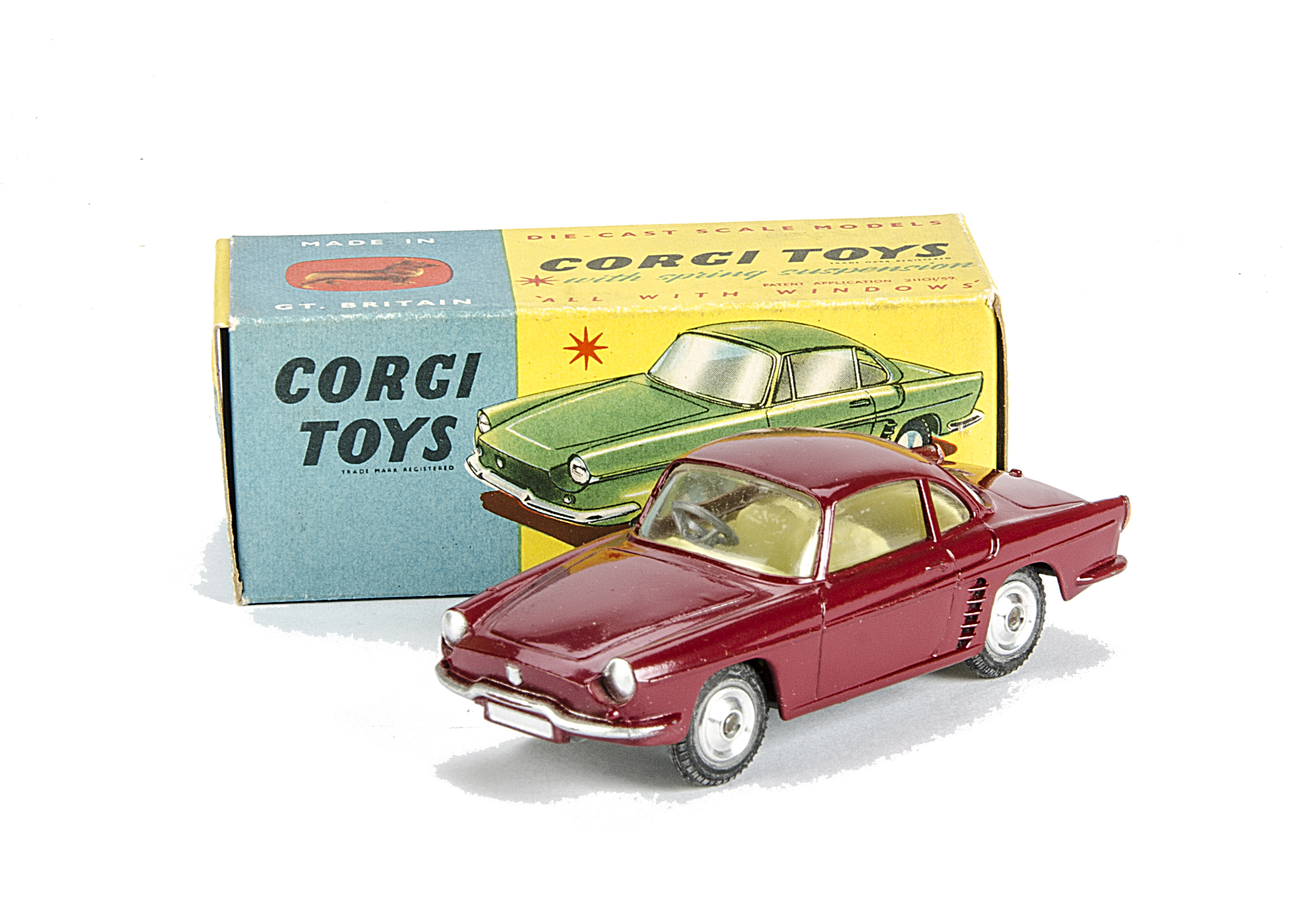 A Corgi Toys 222 Renault Floride, dark red body, yellow interior, spun hubs, in original box, E, box