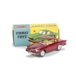 A Corgi Toys 222 Renault Floride, dark red body, yellow interior, spun hubs, in original box, E, box