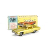 A Corgi Toys 241 Chrysler Ghia L.6.4, metallic lime green body, dark yellow interior, detailed