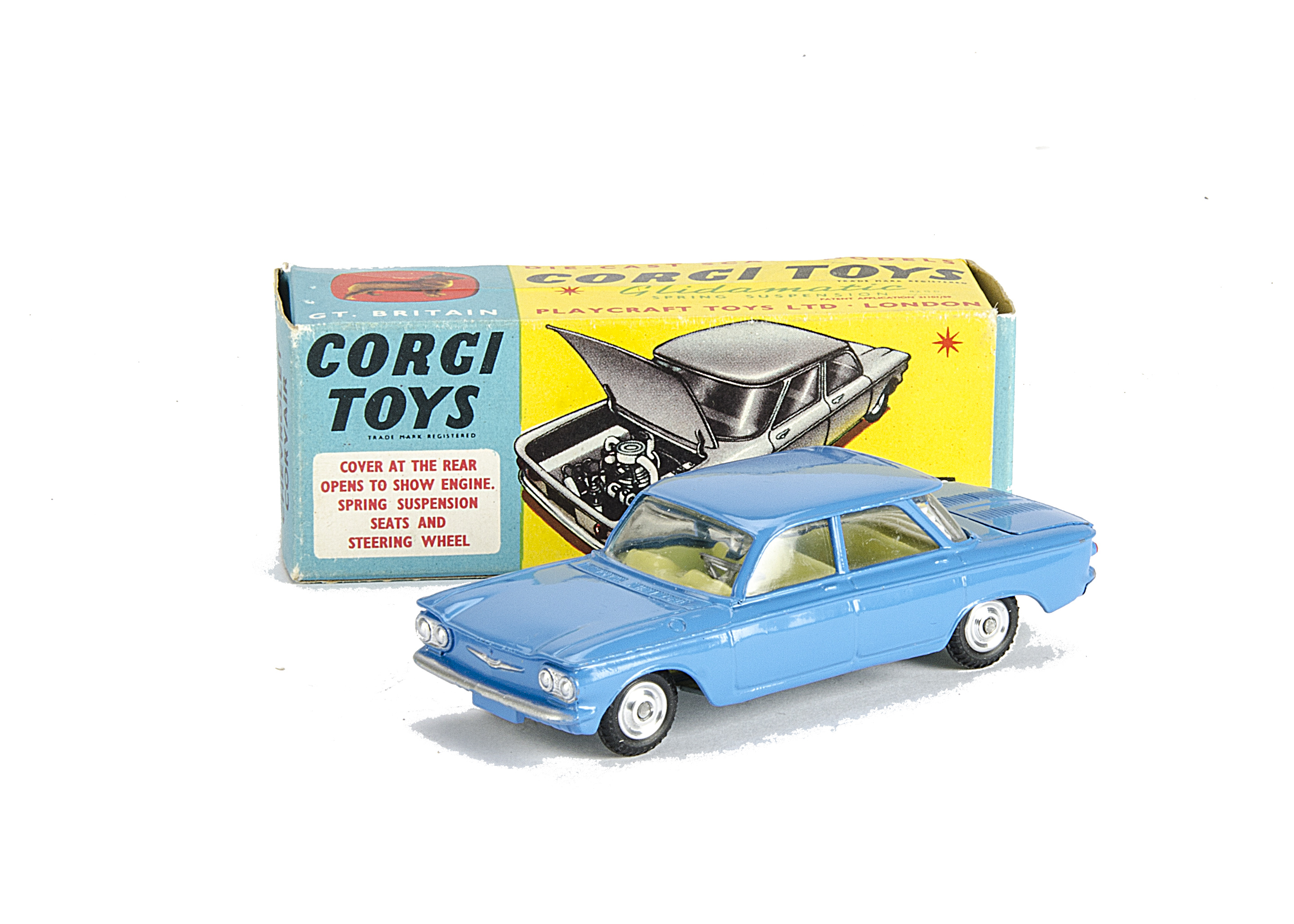 A Corgi Toys 229 Chevrolet Corvair, mid-blue body, yellow interior, spun hubs, in original box, E,