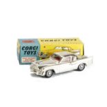 A Corgi Toys 211S Studebaker Golden Hawk, gold plated body, red interior, spun hubs, in original