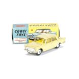 A Corgi Toys 217 Fiat 1800 Saloon, mustard yellow body, bright yellow interior, smooth hubs, in