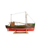 A fine model of Trawler Fishing Boat ‘Eileen’, constructed of wood, black and red hull with