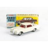 A Corgi Toys 230 Mercedes-Benz 220 SE, cream body, red interior, spun hubs, in original box, E, a