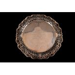 A late Victorian silver presentation card tray, having ornately pierced rim, with engraved