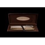 A Parker 75 gold plated silver fountain pen and biro pen set, in box, together with a Parker