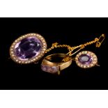 Two 9ct gold and amethyst brooches, one of which set to the rim with seed pearls, plus an amethyst