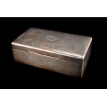 A George V silver cigarette box, with engraved panel to engine turned lid with China and a dragon,