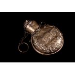 An Edward VII silver perfume bottle holder by William Comyns, having embossed angels and rococo