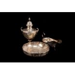 An Edwardian silver sugar caster by Fenton Bros. Ltd., marked Stewart Dawson Ltd., with alhambra