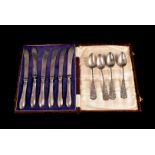 A set of four Chinese silver spoons, plus a boxed set of silver handled cake knives (parcel)
