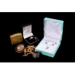 A small group of jewellery, including a 9ct white gold and gem set dress ring, a necklace and