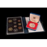 Four commemorative silver proof coins, in presentation cases, together with a collection of cased