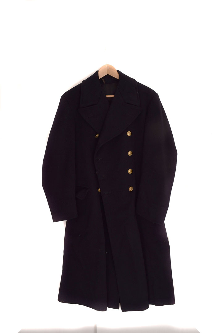 A WWII Royal Navy greatcoat, the full length black coat with four gilt naval buttons to either