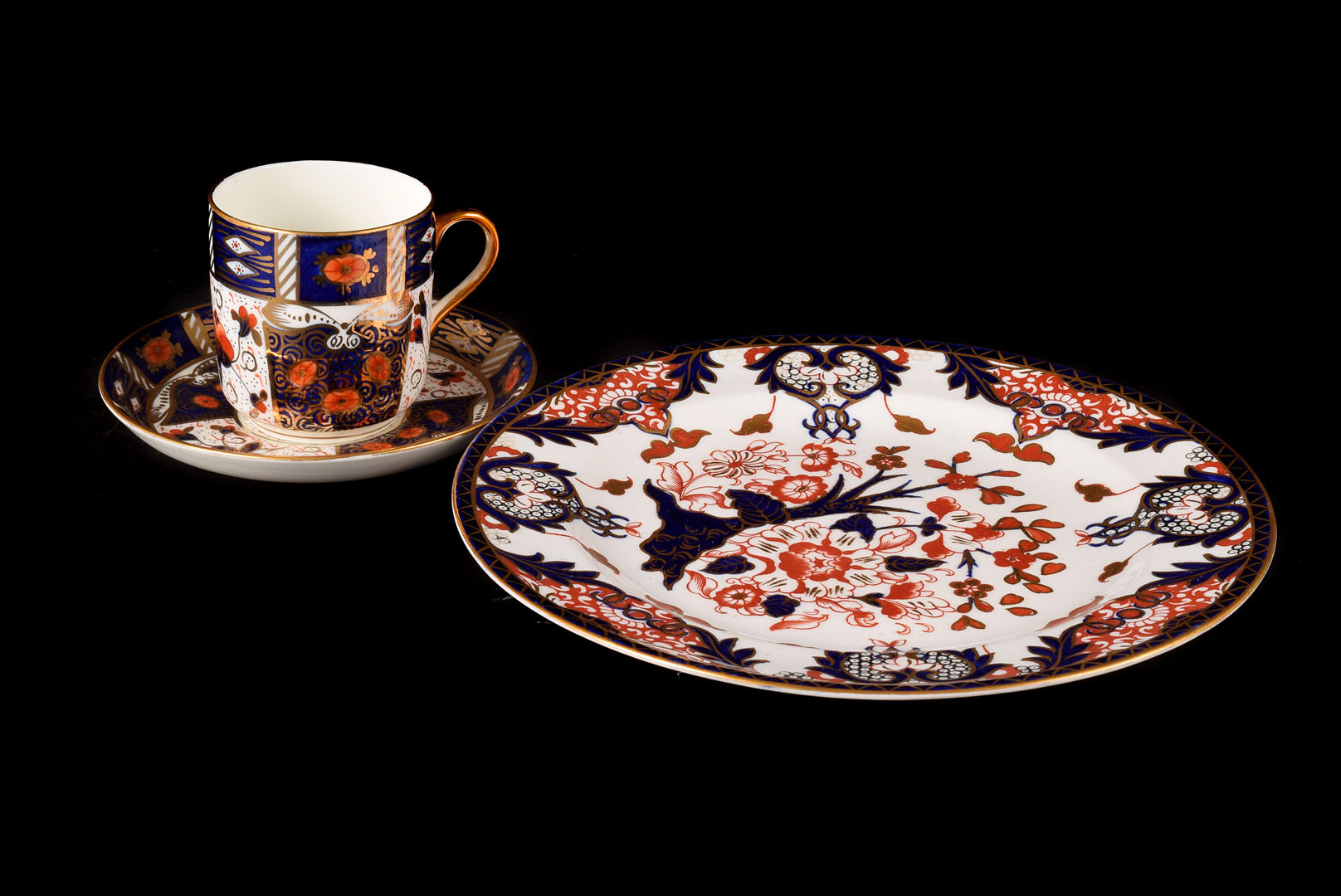 A selection of Imari palette ceramics, including a set of six cups, saucers, and plates; together