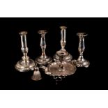 A fine Sheffield plated chamber stick, together with two pairs of Sheffield plated candle sticks,