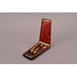 A mid 19th century French silver gilt etui, the rosewood case with fitted interior to support