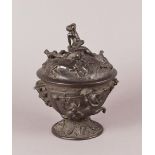 A fine 19th century Roman style bronze cup and cover, the ornate circular bowl on spreading foot