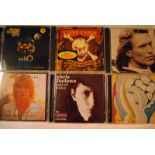 CDs, sixty plus pop and rock mainly from the 70/80s including Eric Clapton, Joe Walsh and Paul