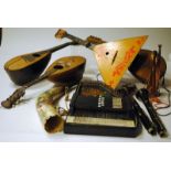 Instruments, mix box lot including three Mandolins,Clarinet all with damage, two decorated Cow