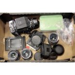 A Mamiya RB67 Pro S Camera, together with various lenses including two 127mm, 90mm and 180mm,