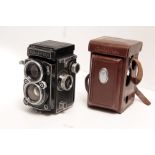 Rolleiflex 2.8 C, type 2 with an f/2.8 Xenar lens and makers leather case