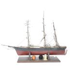 A Scratchbuilt model of Tea Clipper 'Cutty Sark' made with a solid hull and wood fittings,