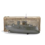 A Sutcliffe hot air propulsion 12'' Model Warship, completed in dark grey, twin funnel and guns,