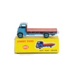 A Dinky Toys 432 Guy Flat Truck, 2nd type mid-blue cab, chassis and hubs, red flatbed, in original