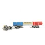 A CIJ No.3/75 Renault Nuclear Tractor Trailer, comprising grey diecast tractor unit, two tinplate