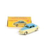 A Dinky Toys 156 Rover 75 Saloon, two tone issue, violet blue upper body, cream lower body and hubs,