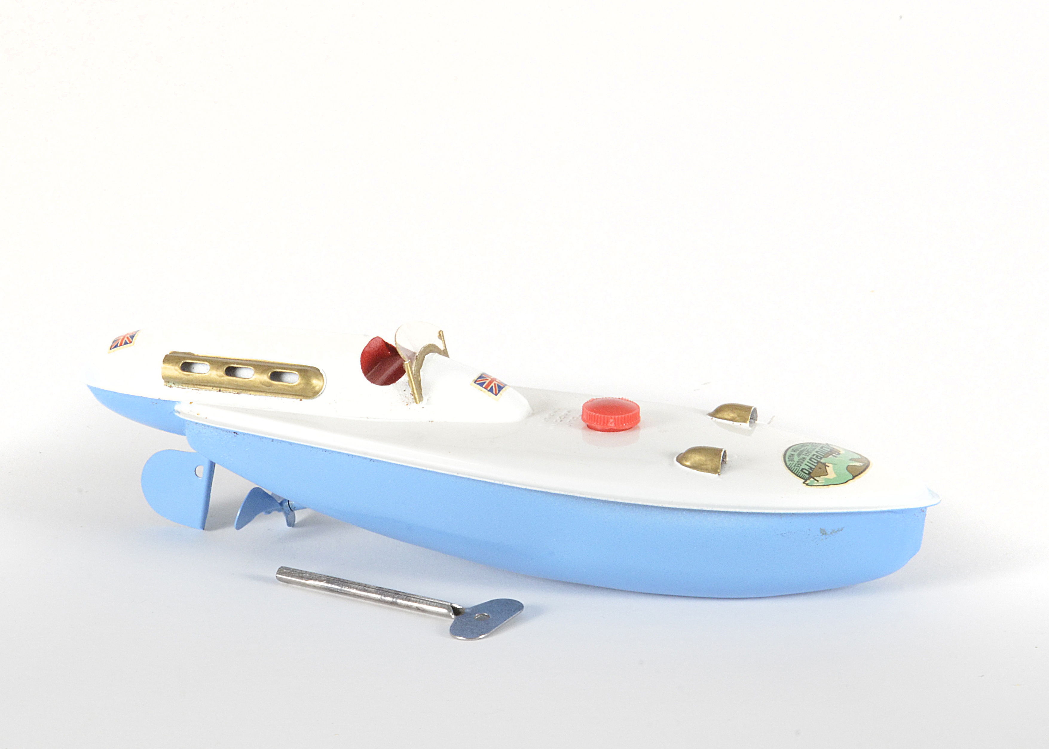 A Sutcliffe clockwork Bluebird Model Boat, in light blue and white, clockwork tested well at time of