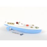 A Sutcliffe clockwork Bluebird Model Boat, in light blue and white, clockwork tested well at time of