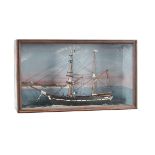 An early 20th Century Diorama in a display case of a Brigantine style twin mast Sailing ship,