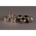 Two pairs of modern silver napkin rings, together with a pair of Indian silver salts, an Indian