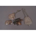 Four silver wine and spirit lables, including a modern cast Gin example of shell design London 1975,