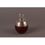 A modern silver and cut ruby glass scent bottle from OPD, the spherical base with silver upper and