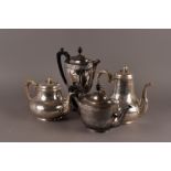 A Victorian four piece silver plated tea set by Elkington & Co, together with another four piece tea