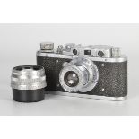 A FED Zorki Rangefinder Camera, chrome, serial no. 02916, with Mockba Industar-22 f/3.5 50mm lens,
